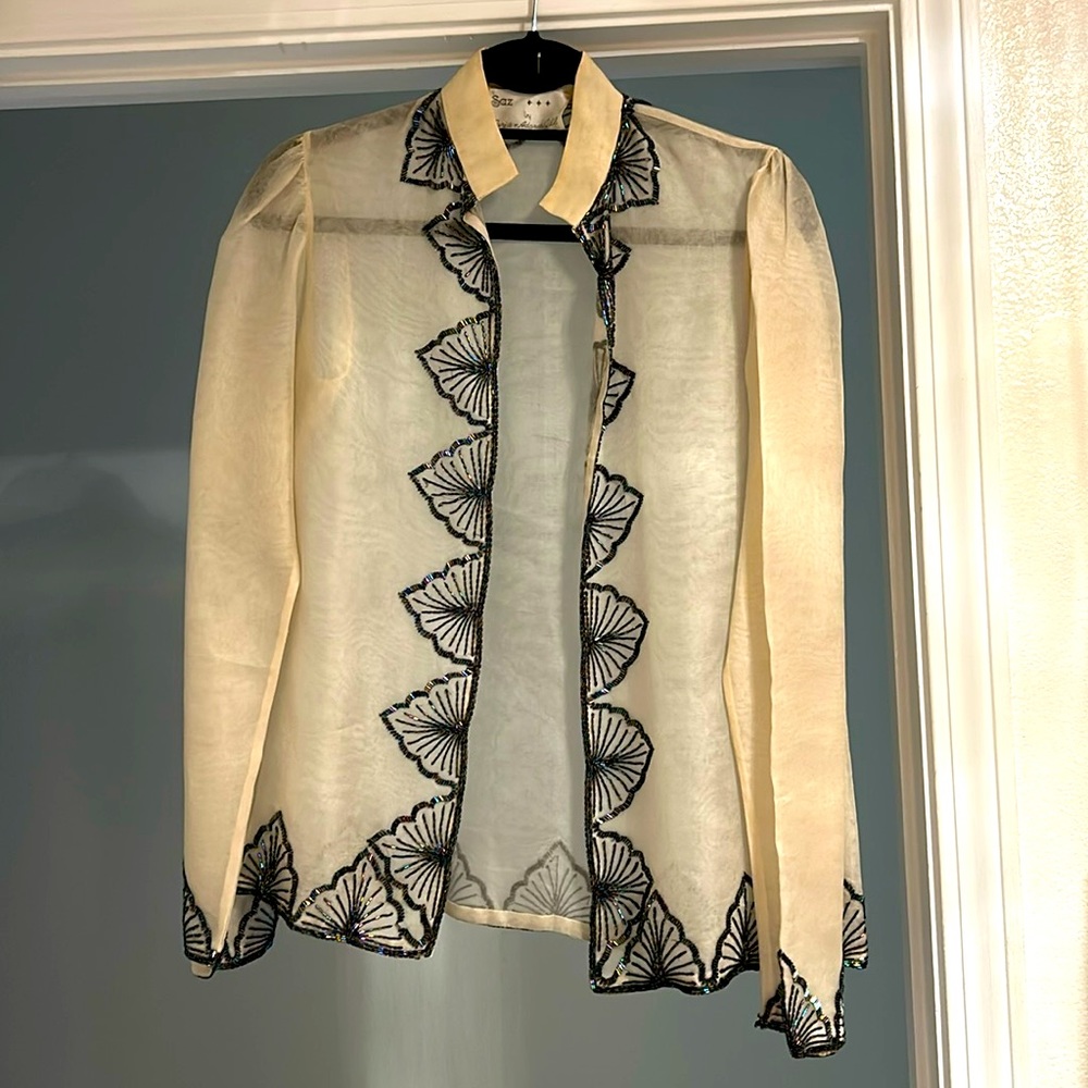 Festive beautifully beaded outer layer.